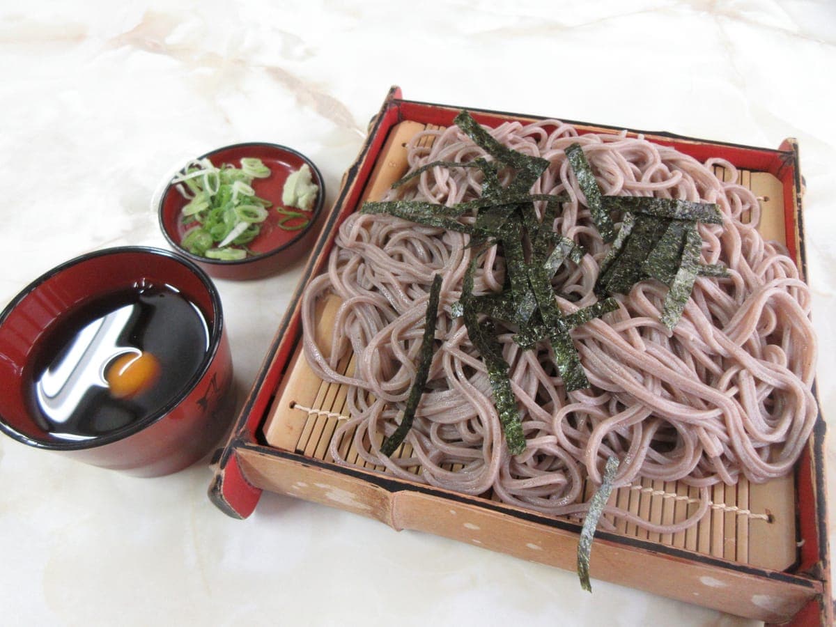 Zaru soba: cold soba noodles on a bamboo tray, with dipping sauce