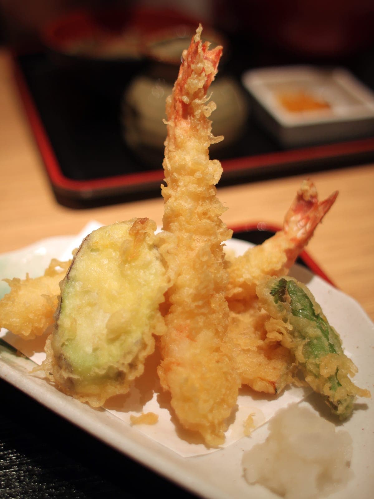 Shrimp and vegetable tempura on a plate