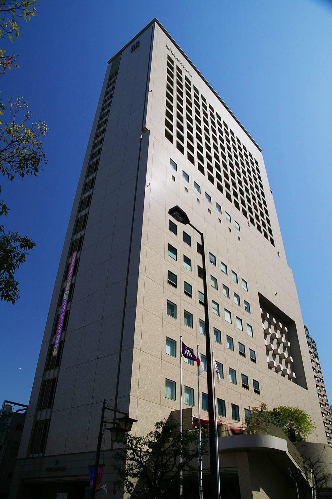 Exterior of the building with Hotel Hanshin Osaka